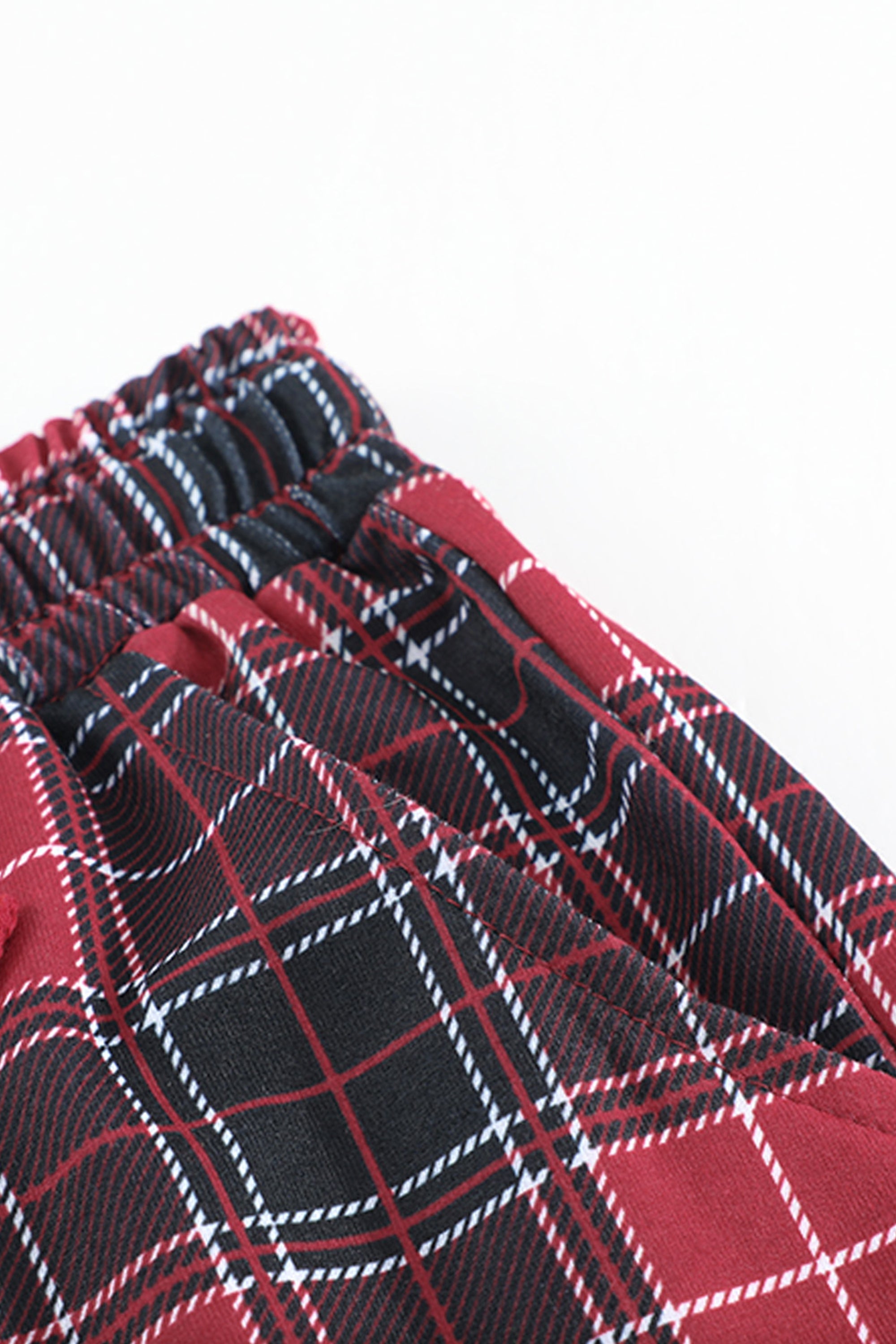 ملابس نسائية بيجاما كريسماس بلوزة كم طويل ساده مع بنطلون نقش مربعات لون احمر